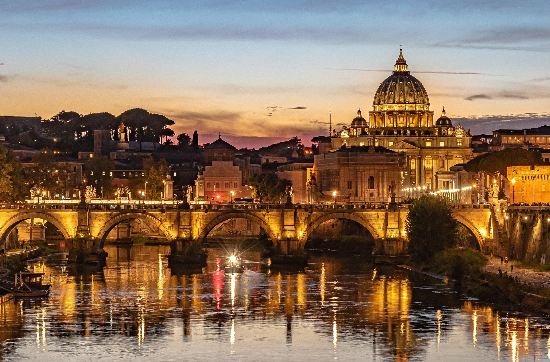 St Peter's Basilica at golden hour over the Tiber